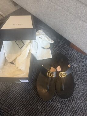 Gucci Black Leather GG Logo Thong Sandals with Gold Hardware